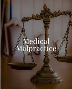 Scales of Justice on Bender and Bender Lawyer's desk regarding medical malpractice.