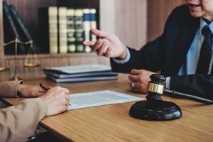 A New York Social Security Disability Lawyer talks with their client.