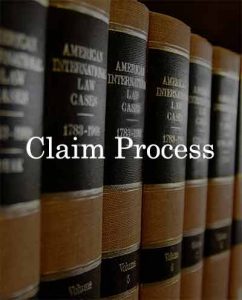 A lawyer's bookshelf contains books about the social security disability claim process.