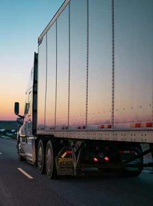 Truck driver driving to social security disability lawyers office to receive SSDI benefits.